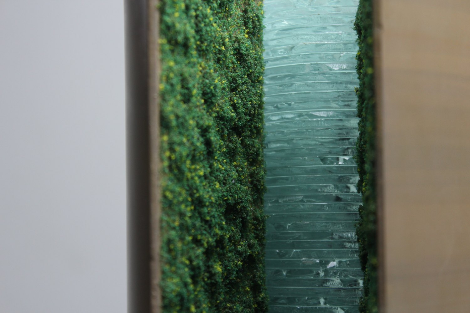 Glass core against the living wall